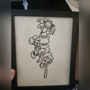 Pen and ink daisy vertebrae art